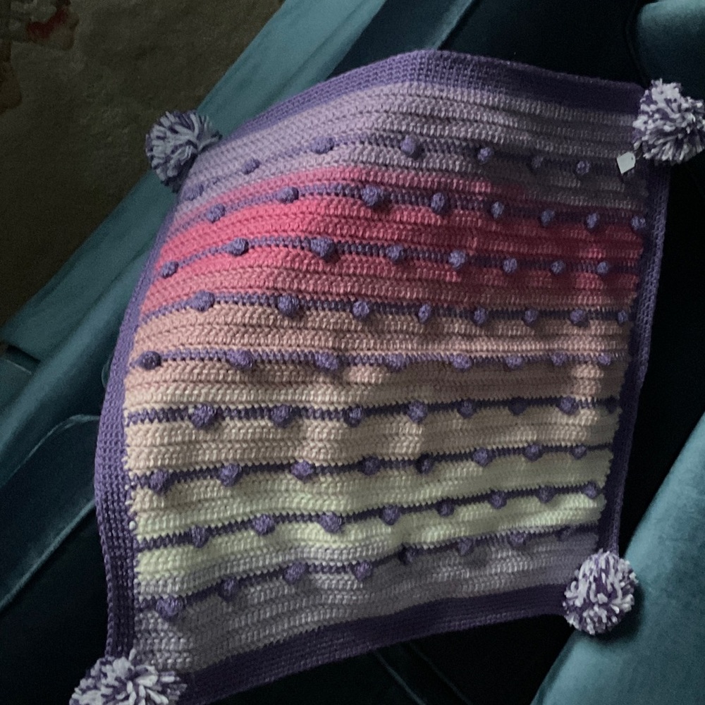 Colorful Knitted Blanket with Pom Poms